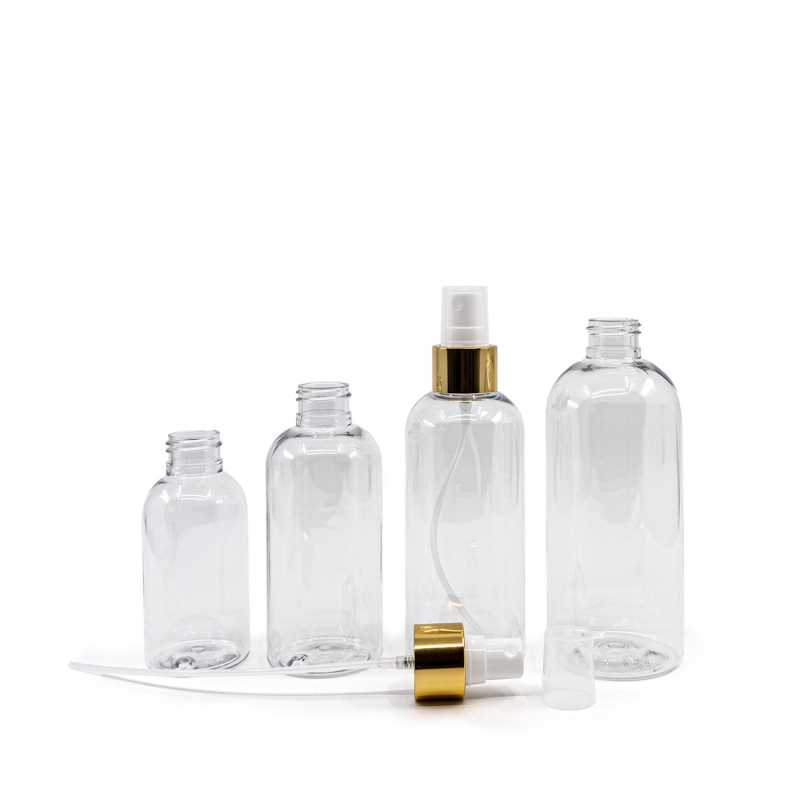Plastová fľaša priehľadná okrúhla, biely rozprašovač, zlatá lesklá obruč, 100 ml