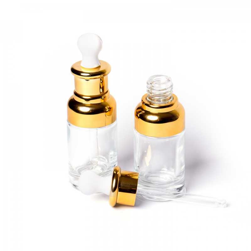 Luxusná sklenená fľaška z hrubého skla s vrchnákom zlatej farby a kvapátkom, vhodná na oleje, esenciálne oleje a tekuté séra.Objem: 20 mlVýška: 10 