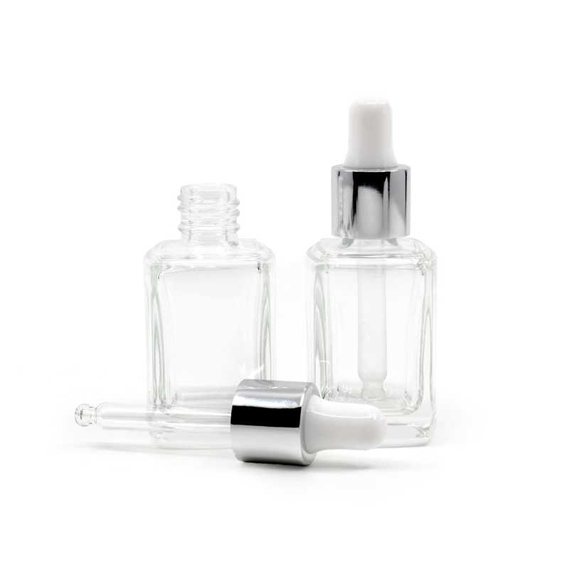Sklenená transparentná fľaška s hranatým dnom je vyrobená z hrubého skla. Slúži na uchovávanie tekutín, sér, tinktúr a pod.
Objem: 10 ml, celkový