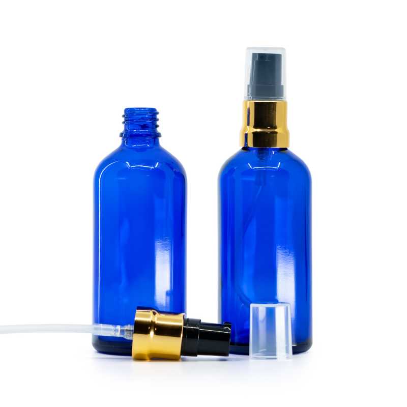 Sklenená fľaška, modrá, čierno-zlatý lesklý dákovač, priehľadný vrch, 100 ml