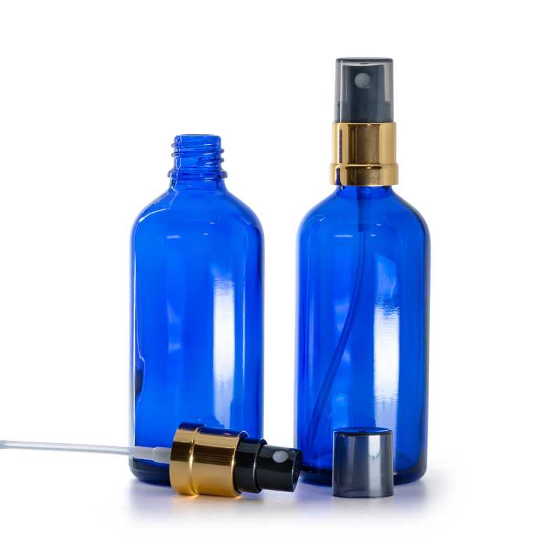 Sklenená fľaška, modrá, čierno-zlatý rozprašovač, dymový kryt, 100 ml