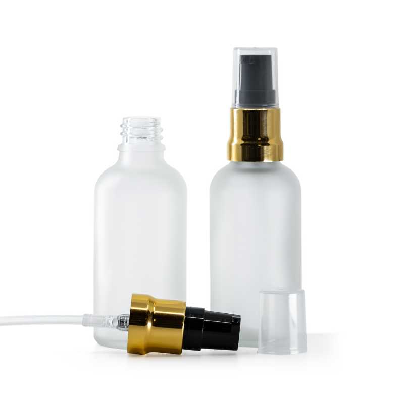 Sklenená fľaška, priehľadná mliečna, čierno-zlatý lesklý dákovač, priehľadný vrch, 50 ml